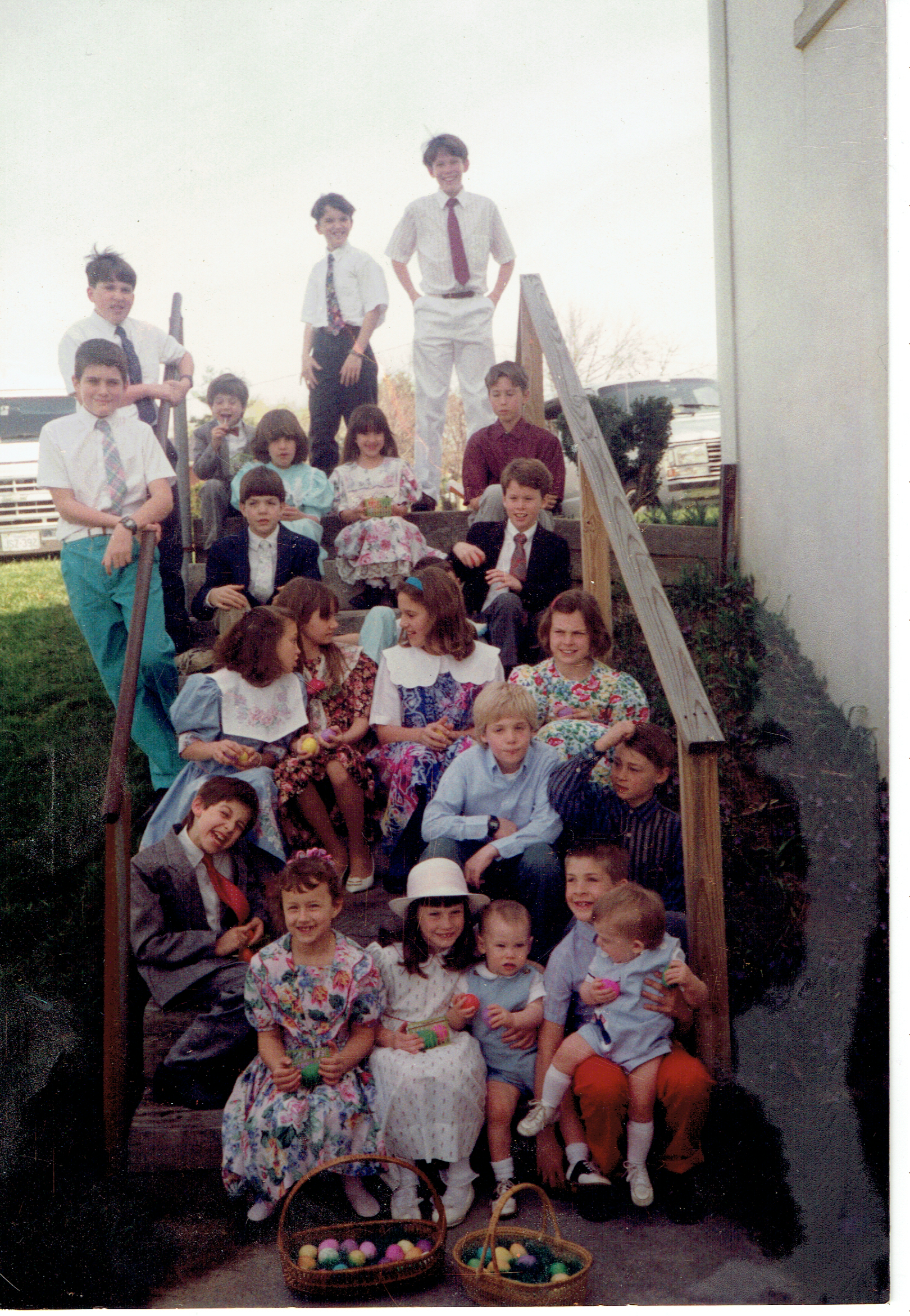 kids on steps behind the church on Easter Sunday 1993